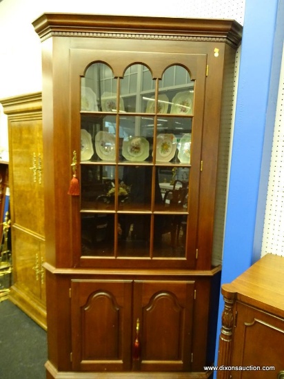 CLASSIC CORNER CABINET; MADE FROM SOLID CHERRY, THIS CABINET HAS CROWN MOLDING ALONG THE TOP OVER