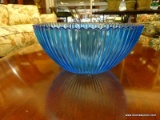 COBALT BLUE GLASS CENTERPIECE ROUND BOWL; FLUTED SIDES, MEASURES 10.75 IN DIAMETER AND 5 IN TALL.