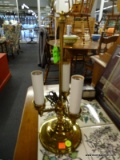 TRIPLE CANDLESTICK LAMP; BRASS POST WITH LOOP FINIAL AND ROUND BASE. STANDS ABOUT 17 IN TALL.