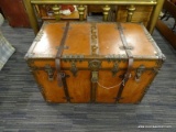 LARGE VINTAGE FLAT-TOP STEAMER TRUNK; LEATHER LOOK AND REDDISH BROWN COLORED FLAT TOP TRUNK IS