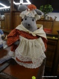 PLUSH WEIGHTED GRANDMA MOUSE; MAKES GREAT DECOR OR DOORSTOP. GREY IN COLOR WITH A RUST COLORED