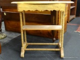 VINTAGE PINE SPOOLED LEG TABLE; SCALLOPED EDGE WITH LOWER TIERED SHELF BENEATH, AND A DOUBLE TRESTLE