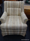 SHUFORD ARM CHAIR; UPHOLSTERED IN A BLUE, CREAM, AND YELLOW UPHOLSTERY. CHAIR MEASURES 32 IN X 38 IN