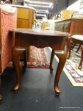 MAHOGANY END TABLE (1 OF A PAIR); HAS QUEEN ANNE FEET AND BANDED TURTLE SHELL SHAPED TOP. MEASURES