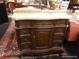 MARBLE AND MAHOGANY SINK FIXTURE; HAS 3 DRAWERS ON EITHER SIDE AND 1 CENTER DOOR. HAS MARBLE