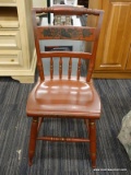 TOLE PAINTED CHAIR; RED TOLE PAINTED PLANK BOTTOM CHAIR. MEASURES 16 IN X 15 IN X 34 IN