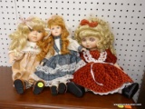 LOT OF DOLLS; 3 ASSORTED CHILDS DOLLS (1 IN A RED DRESS WITH BLONDE HAIR, 1 WITH A BLUE AND LACED