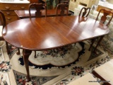 FORMAL QUEEN ANNE DINING ROOM TABLE; INCLUDES AN OVAL SHAPED MAHOGANY QUEEN ANNE TABLE WITH TWO 12