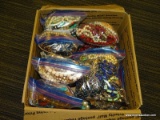 (TAB) DEALERS BOX LOT; INCLUDES COSTUME JEWELRY CONTENTS OF EARRINGS, NECKLACES AND RINGS