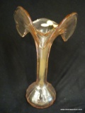 ART GLASS VASE; PINK TINTED GLASS VASE WITH FLARED OUT UPPER EDGE OVER NARROW NECK. FLUTED SIDES,