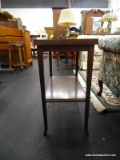 TIERED END TABLE; RECTANGULAR, DARK WOOD FINISH, WITH SQUARE LEGS THAT FLARE OUT AT THE FEET, GIVING