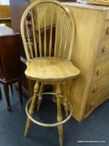 MAPLE WINDSOR STYLE BARSTOOL; BOWED BACK WITH SPINDLES ACROSS, MOLDED SEAT AND ROUND FOOT RAILS