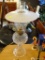(LRM) ANTIQUE OIL LAMP CONVERTED TO ELECTRIC- HAS MILK GLASS REFLECTOR AND CHIMNEY-16