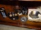 (DR) LOWER SHELF OF CORNER CAB) LOT OF SILVER-PLATE OR GLASS BOWLS WITH SILVER-PLATE RIMS-3