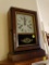 (HALL) ANTIQUE MAHOGANY CASED MANTEL CLOCK WITH REVERSE PAINTING ON DOOR, HAS KEY AND PENDULUM,