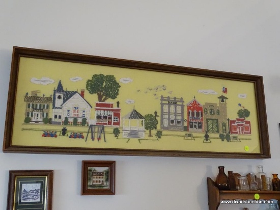 (ENTRANCE HALL) FRAMED CREWEL STITCH OF STREET SCENE IN OAK FRAME-36"W X 13"H