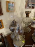 (DR) 2 PEWTER OIL LAMPS- ONE MARKED INTERNATIONAL PEWTER- TALLEST- 17