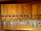 (DR) IN CORNER CAB) TOP SHELF LOT- MISC.. VINTAGE GLASS- 12 WATER GOBLETS, ETCHED GLASS WATER BOTTLE
