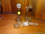 (DR) IN CORNER CAB) 3 ANTIQUE GLASS CANDY CONTAINERS-2 CANDLESTICK PHONES-MARKED VICTORY GLASS-5