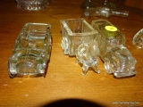(DR) IN CORNER CAB) 3 ANTIQUE GLASS CANDY CONTAINERS- TRUCK WITH METAL WHEELS, DONKEY AND CART AND