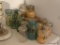 (KIT) LARGE LOT OF CANNING JARS WITH GLASS LIDS AND CONTENTS OF DRIED BEANS AND CORN