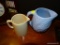 (DEN) LOT OF 2 POTTERY PITCHERS. 1 IS IN BLUE WITH FISH PATTERN AND 1 IS CREAM COLORED
