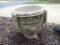 (OUT) 1 OF A PAIR OF CONCRETE GARDEN PLANTERS WITH GREEK KEY AND GRAPE MOTIF: 13 IN X 12 IN