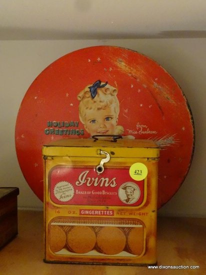 (KIT) 2 ANTIQUE ADVERTISING TINS- IRVIN'S COOKIE TIN- 5"W X "L X 5"H AND HECHT'S FRUIT CAKE TIN- 10"