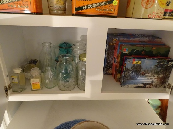 (KIT) CABINET CONTENTS ABOVE FRIG. INCLUDE 4 BOXES OF PUZZLES, CANNING JARS SOME WITH GLASS LIDS AND