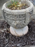 (OUT) 1 OF A PAIR OF CONCRETE GARDEN PLANTERS WITH GREEK KEY AND GRAPE MOTIF: 13 IN X 12 IN