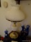 (BED1) BRASS AND HOBNAIL MILK GLASS LAMP. HAS HOBNAIL MILK GLASS SHADE AND CHIMNEY: 23 IN TALL