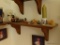 (BED1) WOODEN WALL SHELF: 24 IN X 8 IN X 8 IN WITH CONTENTS OF PORCELAIN DUCK FIGURINES (SOME ARE