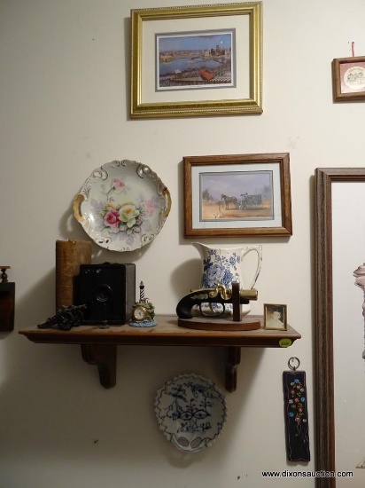 (UHAL) CONTENTS OF WALL NEAR STAIRWAY: WOODEN SHELF, VINTAGE ANSCO CAMERA, VINTAGE PLATE (DATED ON