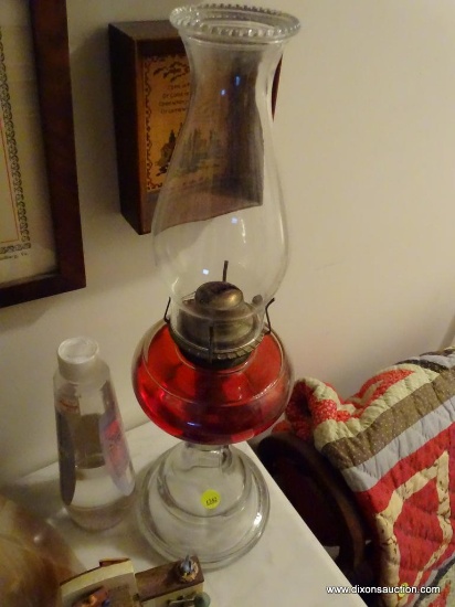 (UHAL) VINTAGE OIL LAMP WITH CHIMNEY AND OIL: 20 IN TALL. INCLUDES AN EXTRA BOTTLE OF OIL.