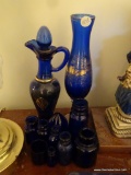 (BED1) LOT OF COBALT BLUE GLASSWARE: SEVERAL SMALL BOTTLES, VASE, EWER WITH STOPPER, ETC.