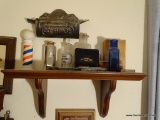 (BED1) WOODEN SHELF: 18 IN X 8 IN X 8 IN WITH VINTAGE SHAVING ITEMS: VINTAGE NITRIC ACID CONTAINER,