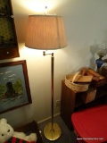 (BED1) BRASS FLOOR LAMP WITH SHADE AND LIGHTHOUSE FINIAL. HAS TOUCH SENSOR FOR LIGHT: 60 IN TALL