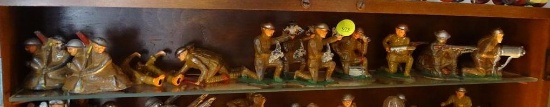 (TOY) SHELF LOT OF 16 ANTIQUE PAINTED METAL WWI SOLDIERS MOST RANGING 3 "H- 2 ON A RAFT, 2 CRAWLING