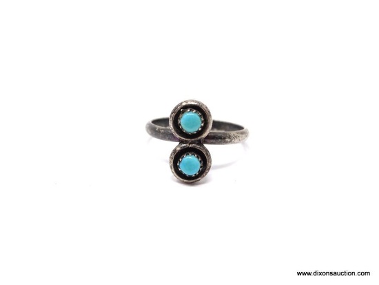 Beautiful vintage native American sterling and turquoise ring. This an unsigned artisan piece and is