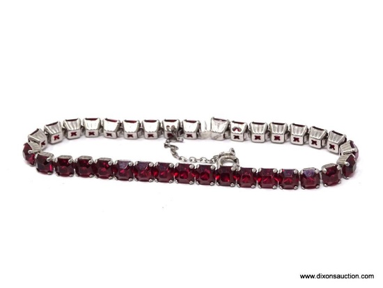 Vintage sterling and wine crystal 7" bracelet of outstanding quality. Once you pick this beauty up