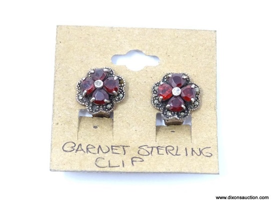 Vintage sterling marcasite and garnet flower clip-on earrings in excellent condition. The deep wine