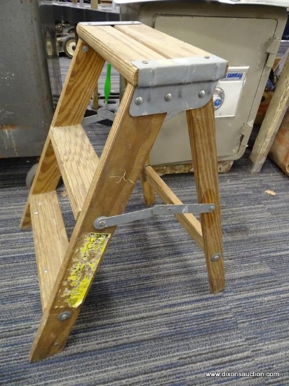 WOODEN STEP LADDER; TWO STEP WOODEN LADDER. MEASURES 22 IN HIGH