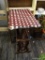 HAND PAINTED MAGAZINE RACK END TABLE; MAHOGANY TABLE WITH A HOLIDAY THEMED RED AND CREAM PLAID