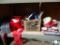 ASSORTED HOLIDAY LOT; INCLUDES RIBBONS AND BOWS, A PAIR OF LIGHTED WINDOW CANDLES, BOXES ORNAMENTS,