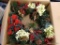 WREATH; PINE THEMED WREATH WITH PLAID RIBBON, WHITE FLOWERS, AND ARTIFICIAL BERRIES. INCLUDES A