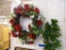 WREATH AND GARLAND LOT; GRAPEVINE WREATH WITH RED, WHITE, AND CREAM COLORED FLOWERS, ASSORTED