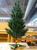 SMALL ARTIFICIAL CHRISTMAS TREE; 24 INCH (2 FOOT) TREE WITH COLLAPSIBLE BRANCHES AND PLASTIC STAND.