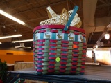 HOLIDAY BASKETS LOT; LOCATED ON TOP OF SHELVING UNIT.