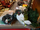 DECORATIONS LOT; INCLUDES PINE GARLAND, WHITE ARTIFICIAL POINSETTIA, GREEN EXTENSION CORD, AND BOX