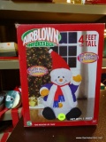 AIRBLOWN INFLATABLE SNOWMAN; IN ORIGINAL BOX,, PLUGS INTO STANDARD OUTLET, MEASURES 4 FT TALL.